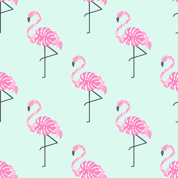 Tropical trendy seamless pattern with pink decorative flamingos from palm leaves on mint green background. Exotic Hawaii art background. Fashion design for fabric, wallpaper, textile and decor.