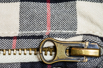 Zipper a detail of jeans close up