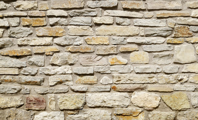 Grey stone wall background. Surface stone wall background.