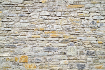 Grey stone wall background. Surface stone wall background.