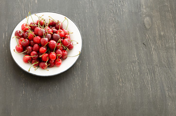 Plate of ripe cherries