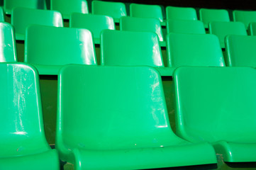 Empty green seats in stadium