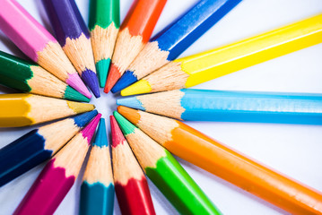 Colorful pencils in arrange in color wheel colors