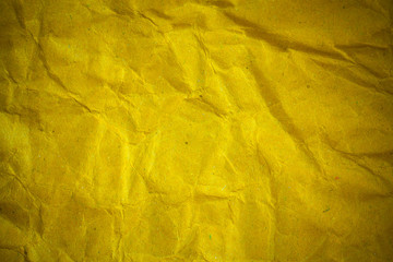 Texture crumpled yellow paper background.