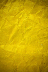 Texture crumpled yellow paper background.