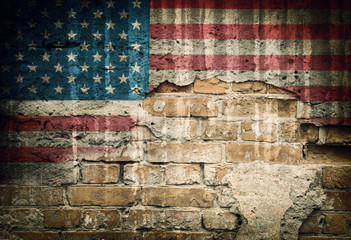 Grunge USA flag on brick wall background