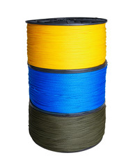 Column of three skeins of synthetic rope of yellow, blue and green colors isolated on white background