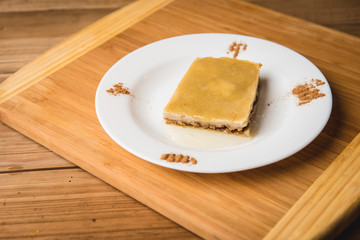 Piece of delicious snack on white plate