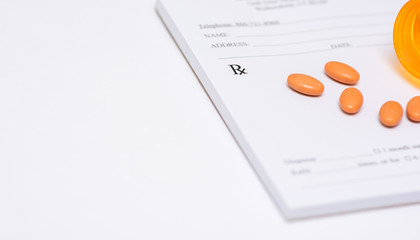 pills on a prescription pad © rohane