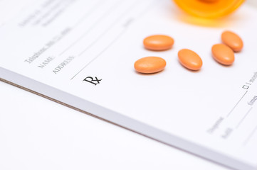pills on a prescription pad © rohane