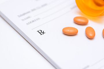 pills on a prescription pad © rohane