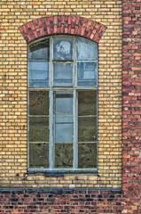 WINDOW - Brick facade of an old building