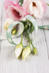 Eustoma flowers and star green ribbon