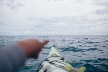 in the sea on a kayak