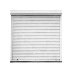 Window with closed blinds on old building