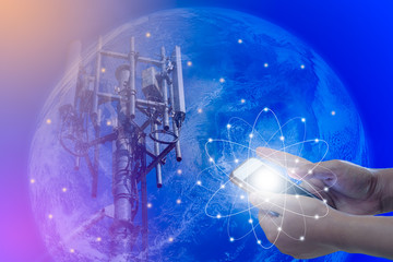 The concept of world communications, Smartphone in woman hand and Telecommunications tower on blue earth background, Elements of this image furnished by NASA