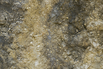 Natural stones and soil cliff wall texture. Corfu island, Greece. 