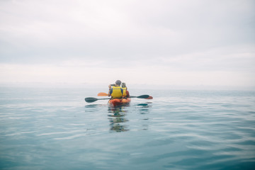 in the sea on a kayak