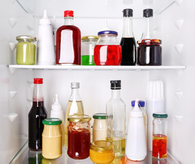 Many different sauces in fridge