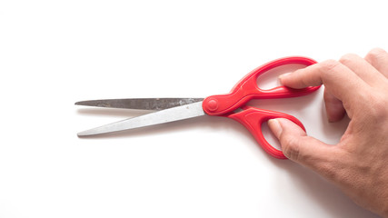 Scissors red Isolated on white background with hand
