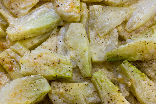 Fennel cooked in a pan with cheese