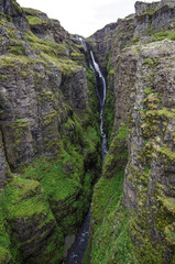 Scenic view of The Glymur Waterfall - second highest waterfall of Iceland