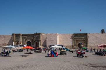  Lahdim Square of medieval imperial city of Meknes with Bab el Mansour gate at background, Morocco.