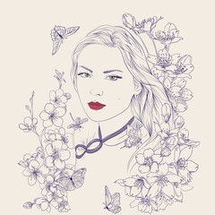 Young pretty woman portrait. Sakura flowers blossom. Romantic lady girl