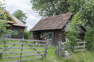 Fototapeta na wymiar A typical wooden house of Maramures region.