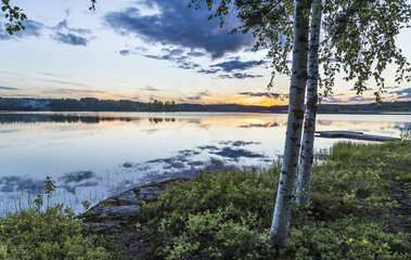 Naklejka premium Beautiful midsummer night in Finland next to lake