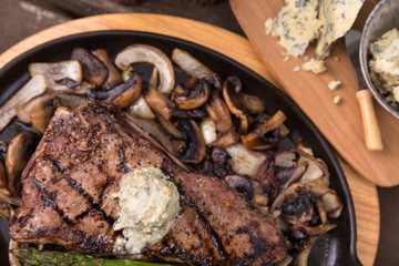 BBQ steak on cast iron from above