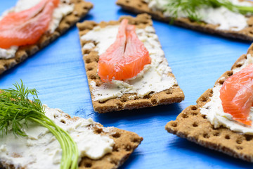 Healthy lunch, of crispbread with salmon and cream cheese