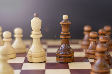 Concept of leadership, success, motivation. Chess pieces on the Board.
