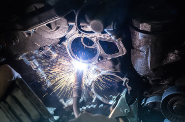 Welding work on car engine
