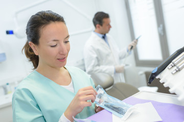 nurse preparing an injection syringe