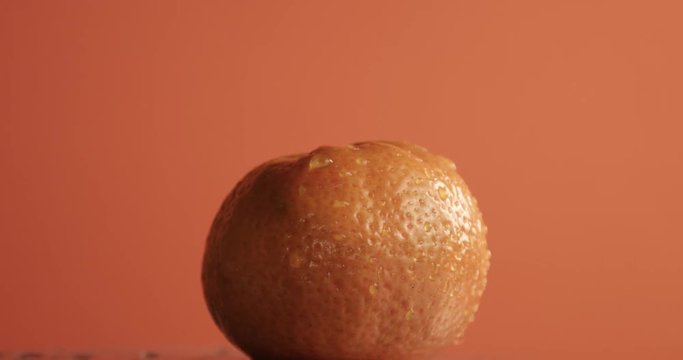 mandarin turning on its axis footage