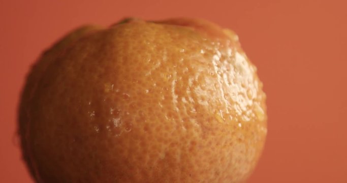 mandarin turning on its axis footage
