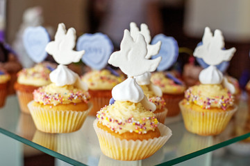 Tasty cupcakes. Birdie. The concept of food, party and wedding.