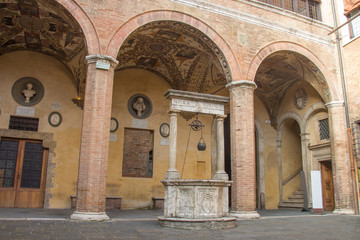 Inner courtyard of Palazzo Chigi-Saracini, SIena, Tuscany, Italy.