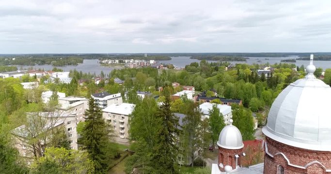 Lappeenranta church, Cinema 4k aerial view over villtmandsstrand church, revealing the city and saimaa lake, in Karelia, Finland