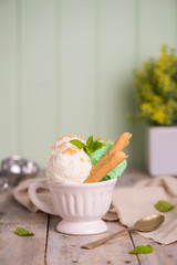 Vanilla and mint ice cream in cup