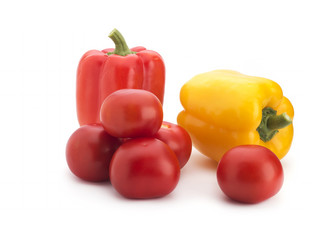 Peppers and tomatoes on a white background