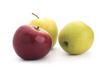 Green and red apples on a white background