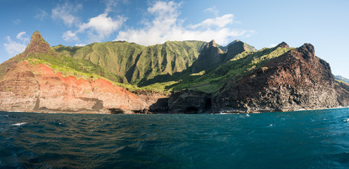 Naklejka premium Na Pali coastline taken from sunset cruise along Kauai shore