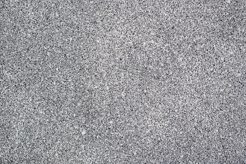 Small clean coloured sand background.