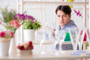 Young handsome man shopping in shop