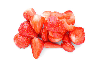 Pieces of tasty red strawberries on white background, closeup