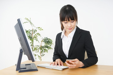 Businesswoman doing a deskwork at office