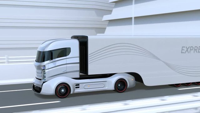 A fleet of autonomous trucks driving on highway. Connected cars concept. 3D rendering animation.