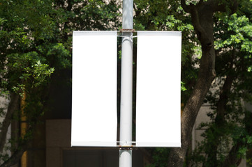 Large blank billboard on a street wall, banners with room to add your own text